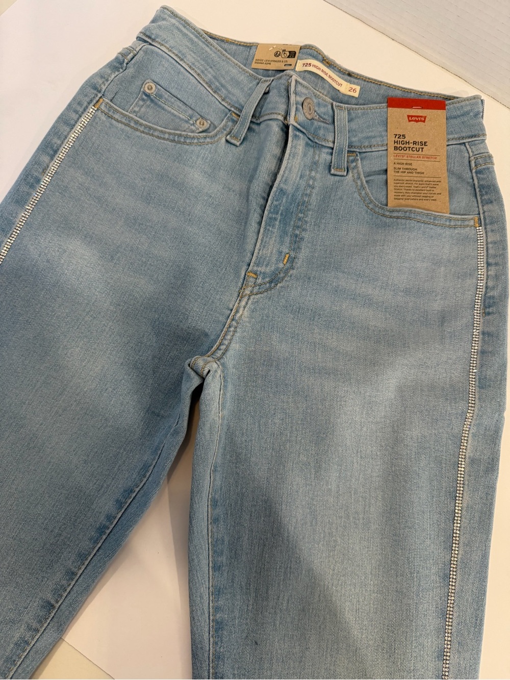 Levi's 725 High-Rise Bootcut Jeans - Light Blue 25 with rhinestones